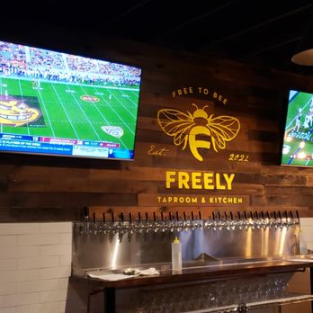Freely Taproom & Kitchen - taps with logo - Beer Bar Near Me - Tempe, Arizona Freely Taproom & Kitchen - taps with logo - Beer Bar Near Me - Tempe, Arizona