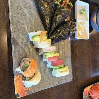 Oishi Sushi - AYCE sushi - salmon avocado hand rolls and a rainbow roll. - Sushi Bars Near Me - Conroe, Texas
