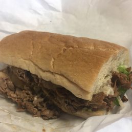a roast beef sandwich in a wrapper