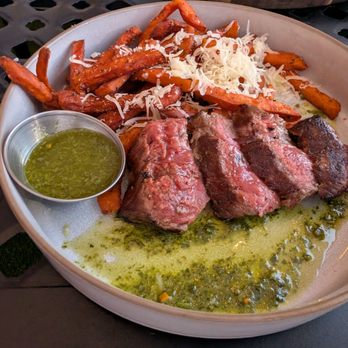 The Hills - NY steak and fries with extra Chimichurri - New American Near Me - Tucson, Arizona The Hills - NY steak and fries with extra Chimichurri - New American Near Me - Tucson, Arizona