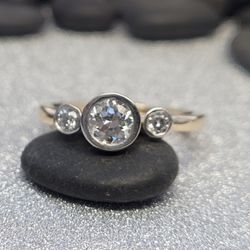 Jewelry Set in Stone - Custom 3 stone bezel diamond ring set in platinum and 18k yellow gold