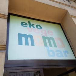 Momo - Exterior over door sign