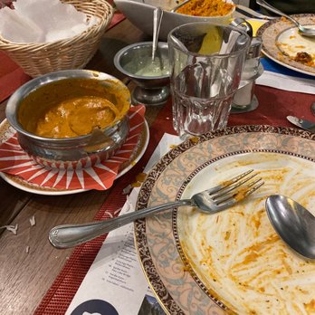 Taj Mahal - Butter chicken & white rice, chicken tikka biryani. - Indian Near Me - Interlaken, BE Taj Mahal - Butter chicken & white rice, chicken tikka biryani. - Indian Near Me - Interlaken, BE