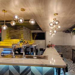 M&T CAFE & BAR - I LOVE the interior design at the bar. Looks really good.
