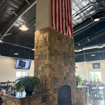 Hairy Cow Brewing Company - Two-story fireplace in the middle of the large taproom. - Brewpubs Near Me - Box Elder, South Dakota Hairy Cow Brewing Company - Two-story fireplace in the middle of the large taproom. - Brewpubs Near Me - Box Elder, South Dakota