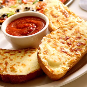 Carbones Pizzeria - two slices of bread and a bowl of tomato sauce - Pizza Near Me - Edina, Minnesota Carbones Pizzeria - two slices of bread and a bowl of tomato sauce - Pizza Near Me - Edina, Minnesota