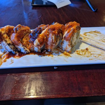 Sushi Raku - Giant Roll. Boy is it ever! I'm full off of three pieces. - Japanese Near Me - Concord, California Sushi Raku - Giant Roll. Boy is it ever! I'm full off of three pieces. - Japanese Near Me - Concord, California