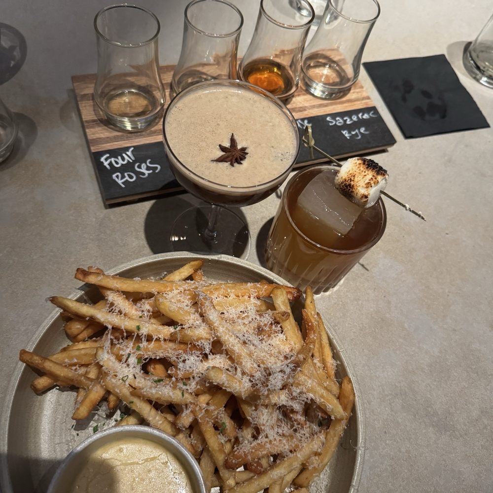 Eureka! Henderson - espresso martini and campfire cocktail. Truffle Cheese Fries - American Near Me - Henderson, Nevada