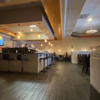 Six Happiness - a view of a restaurant from the dining room - Asian Fusion Near Me - Leland, North Carolina
