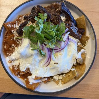 SeD Cocina - chilaquiles divorciados with skirt steak and two over medium eggs. - Mexican Near Me - Montclair, California