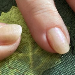 US Nails - Waterloo - Nails were polished over ridged acrylic