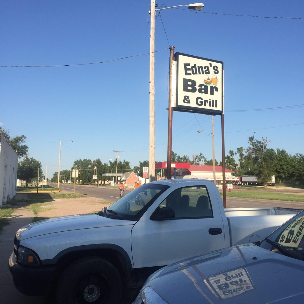 Edna's Place - a sign for edna's bar and grill - American Near Me - Macksville, Kansas