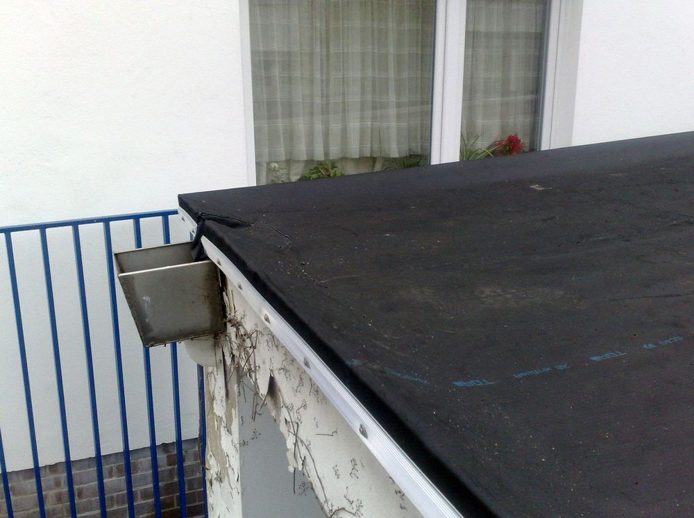 Slide of Arlanza Roofing