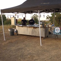 Tacos Los Pochos - outside grill and tent