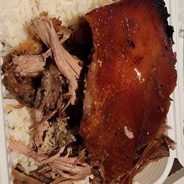 Crispy skin, tender roast pork with rice. Crispy skin, tender roast pork with rice.