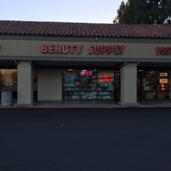 La Sierra Beauty Supply - It's on the corner. Next to the post office place and the Chinese food.