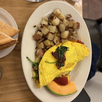 Break'n Eggs Crêperie Express - Create your own 3 Egg Cheddar Omelette with spinach, peppers, and bacon. - Creperies Near Me - Amherst, New York Break'n Eggs Crêperie Express - Create your own 3 Egg Cheddar Omelette with spinach, peppers, and bacon. - Creperies Near Me - Amherst, New York