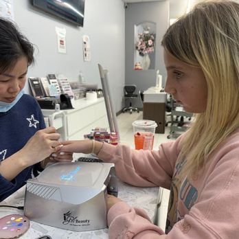 Blu Skye Nails and Spa - Connie doing Sydney's beach nails - Nail Salons Near Me - Anaheim, California Blu Skye Nails and Spa - Connie doing Sydney's beach nails - Nail Salons Near Me - Anaheim, California