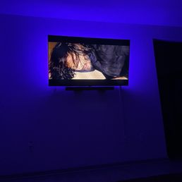 65" ULED Flat Screen with sound bar and LED lights
