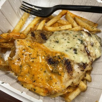 California Fish Grill - SWAI (WHITE/FISH) with half Cajun & half garlic sauce & French fries - Seafood Near Me - Pasadena, California California Fish Grill - SWAI (WHITE/FISH) with half Cajun & half garlic sauce & French fries - Seafood Near Me - Pasadena, California
