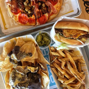 Orderup - T-Rex Pizza. Original Nachos. Cheese fries. La Bomba Burger. - Burgers Near Me - San Antonio, Texas Orderup - T-Rex Pizza. Original Nachos. Cheese fries. La Bomba Burger. - Burgers Near Me - San Antonio, Texas
