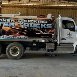 Sooner Trucking LLC, Water Trucks - 4000-gallon construction water truck.