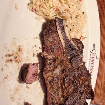 LongHorn Steakhouse - Ribeye and pilaf rice as a side - Steakhouses Near Me - Spring, Texas