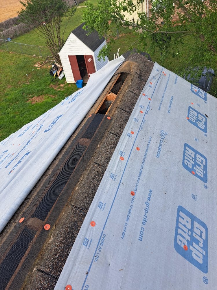 Slide of Mike's roofing and repairs