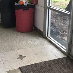 Ash Flat Coin Laundry - Overflowing trash cans.
