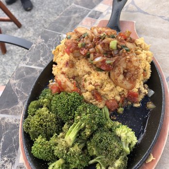 T Lawson’s Grill - Shrimp and grits. This looked a little thicker than we are used to but it was hearty. We did not have the bacon as we are pescatarian. - Sports Bars Near Me - Grand Rivers, Kentucky