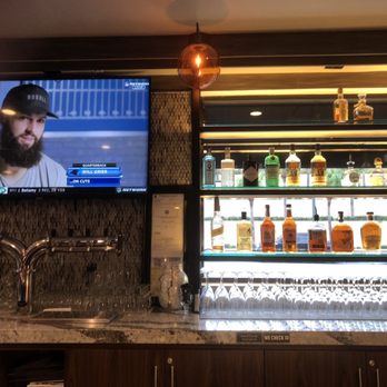 Delaney's Tavern - Bar facing the tv screen - New American Near Me - Orlando, Florida Delaney's Tavern - Bar facing the tv screen - New American Near Me - Orlando, Florida