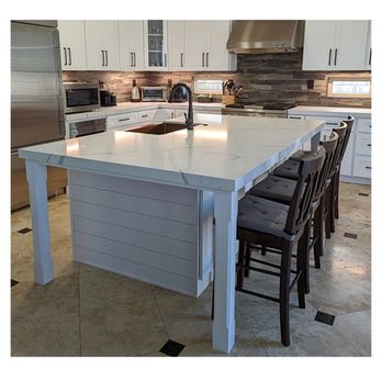 Excel Painting and Construction - a picture of a kitchen island - General Contractors Near Me