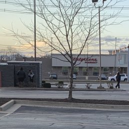 Workers at KFC during shift change. Workers at KFC during shift change.