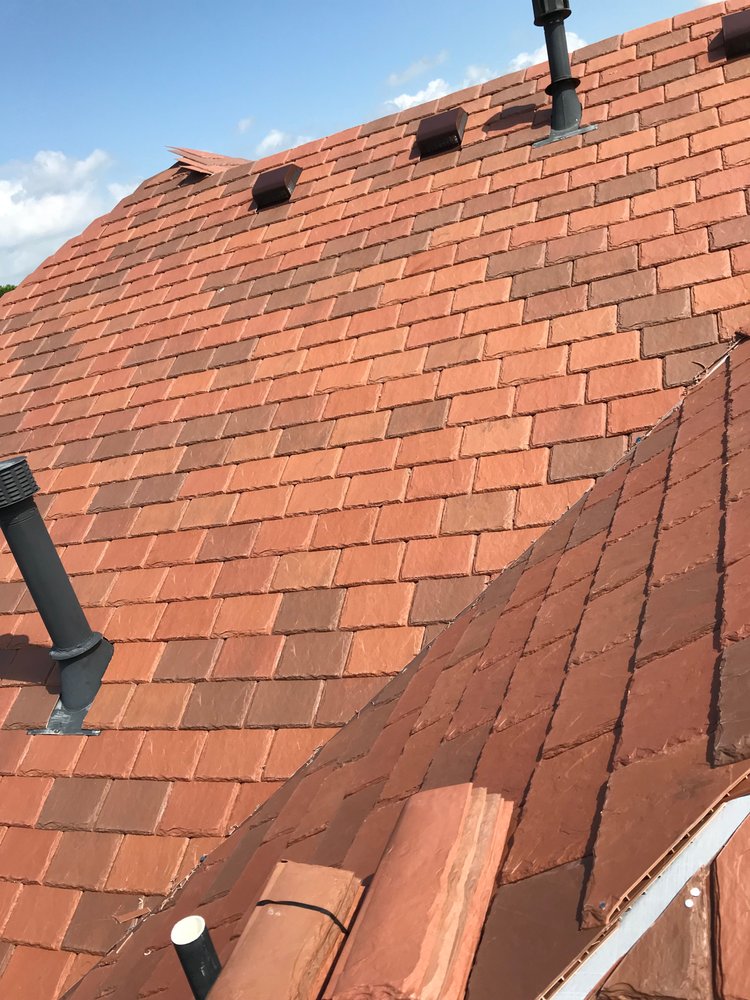 Slide of Home Team Roofing