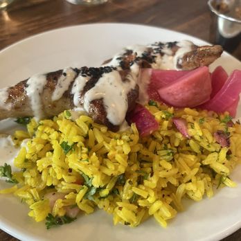 Thistle & Leek - shawarma spiced chicken, turmeric rice, sumac onions, garlic yogurt - Gastropubs Near Me - Newton, Massachusetts Thistle & Leek - shawarma spiced chicken, turmeric rice, sumac onions, garlic yogurt - Gastropubs Near Me - Newton, Massachusetts