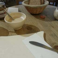 Le Pain Quotidien - Cappuccino met sojamelk en broodplankje