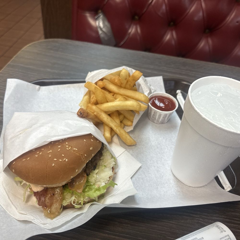 11 something cheeseburger ended up being 15.30 with bacon added it was an extra $4 11 something cheeseburger ended up being 15.30 with bacon added it was an extra $4