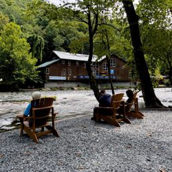 Nantahala Outdoor Center - Plenty of chairs to sit and relax. This isn't "us" but someone our age. LOL