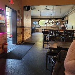 Grizzly's Wyandotte - Pool tables and seating area.