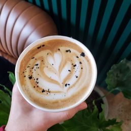 Salted caramel latte with black flaky salt (and love the wall panels) Salted caramel latte with black flaky salt (and love the wall panels)