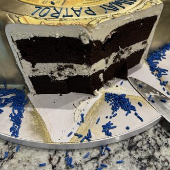The Crimson Cake - Luscious cookies and cream filling with moist chocolate cake. - Custom Cakes Near Me - Oceanside, California The Crimson Cake - Luscious cookies and cream filling with moist chocolate cake. - Custom Cakes Near Me - Oceanside, California