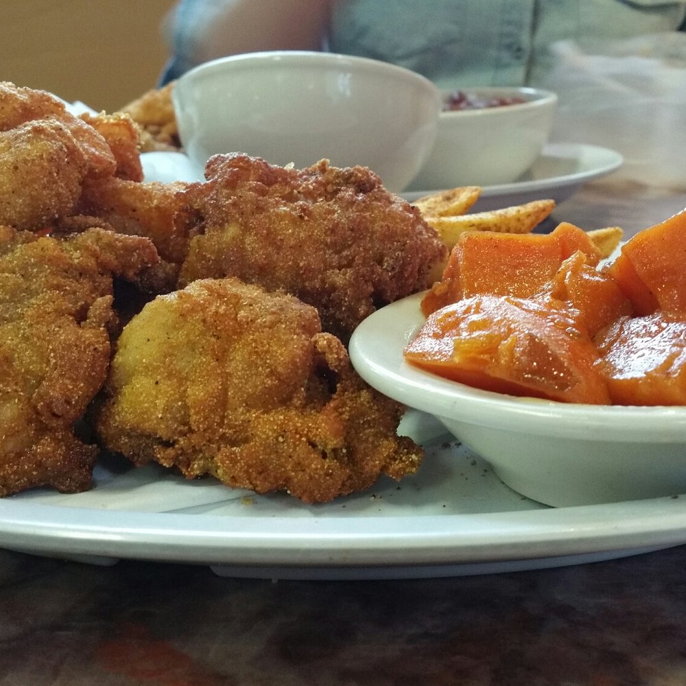 Big Momma's Kitchen - Three-way shrimp, oyster and fish po' boy with candied yams and cajun fries. - Southern Near Me - Oakland, California Big Momma's Kitchen - Three-way shrimp, oyster and fish po' boy with candied yams and cajun fries. - Southern Near Me - Oakland, California