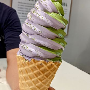 Premium Matcha Cafe Maiko - Waffle cone filled with matcha-ube soft serve topped with gold flakes. - Ice Cream & Frozen Yogurt Near Me - Tempe, Arizona Premium Matcha Cafe Maiko - Waffle cone filled with matcha-ube soft serve topped with gold flakes. - Ice Cream & Frozen Yogurt Near Me - Tempe, Arizona