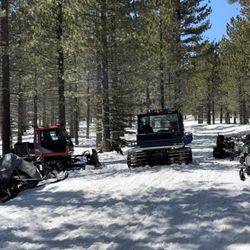 Cold stream Adventures - Snow cat clearing the trails.