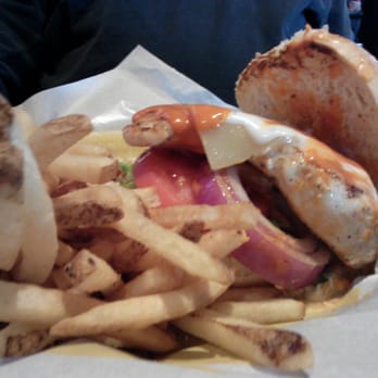 Buffalo Wild Wings - Buffalo Chicken Sandwich with Ranch and Medium Wing Sauce with Tomatoes, Lettuce and onions served with a pickle and fries. - Chicken Wings Near Me - Smyrna, Tennessee