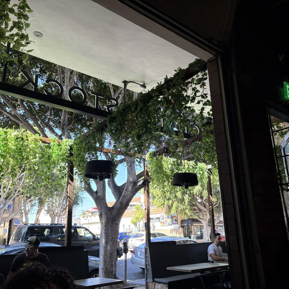 Common Stock - Inside looking outside - New American Near Me - San Diego, California Common Stock - Inside looking outside - New American Near Me - San Diego, California