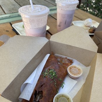 La Santa Barbacha - Crispy cheese taco and near empty pink horchatas (so good!) - Mexican Near Me - Austin, Texas
