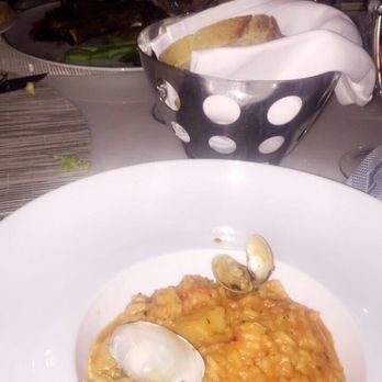 Lago - Seafood risotto and complimentary bread. - Italian Near Me - Las Vegas, Nevada
