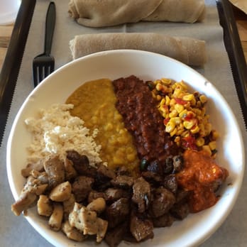 Nazrawi Ethiopian Restaurant - Sample plate with two proteins, lamb and chicken. - Ethiopian Near Me - Silver Spring, Maryland Nazrawi Ethiopian Restaurant - Sample plate with two proteins, lamb and chicken. - Ethiopian Near Me - Silver Spring, Maryland