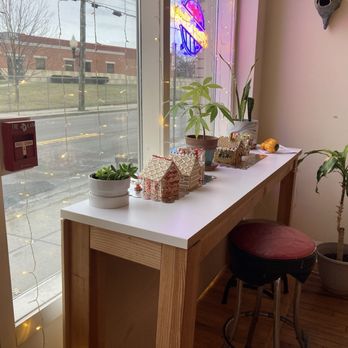 Cafe Liuga Haus - Front window during their gingerbread house community activity. - Ice Cream & Frozen Yogurt Near Me - Binghamton, New York